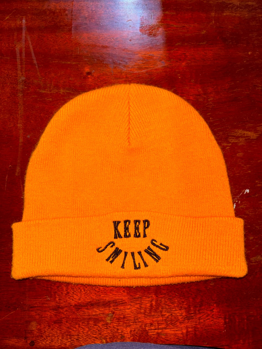 Keep Smiling Orange Cuffed Beanie Hat